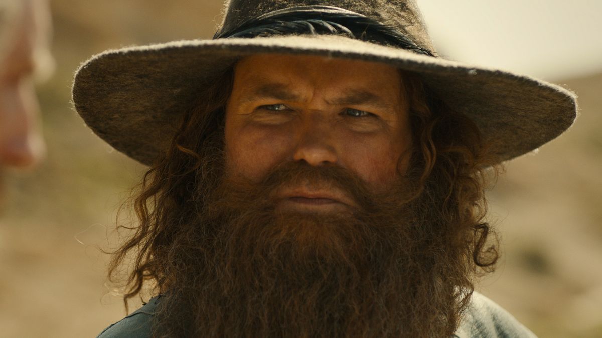 A screenshot of Rory Kinnear as Tom Bombadil in The Rings of Power season 2.