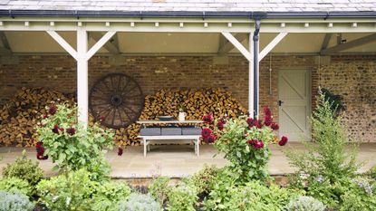 Large county garden with patio space and dining table