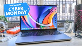 MacBook Pro 14 2021 with Cyber Monday badge