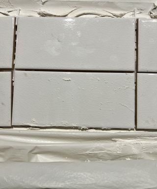 White metro tiles with white grout