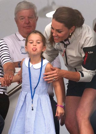 Princess Charlotte of Cambridge sticks out her tongue