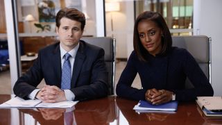 Jason Ritter as Julian Markston and Skye P. Marshall as Olympia Lawrence in an office in Matlock episode 6