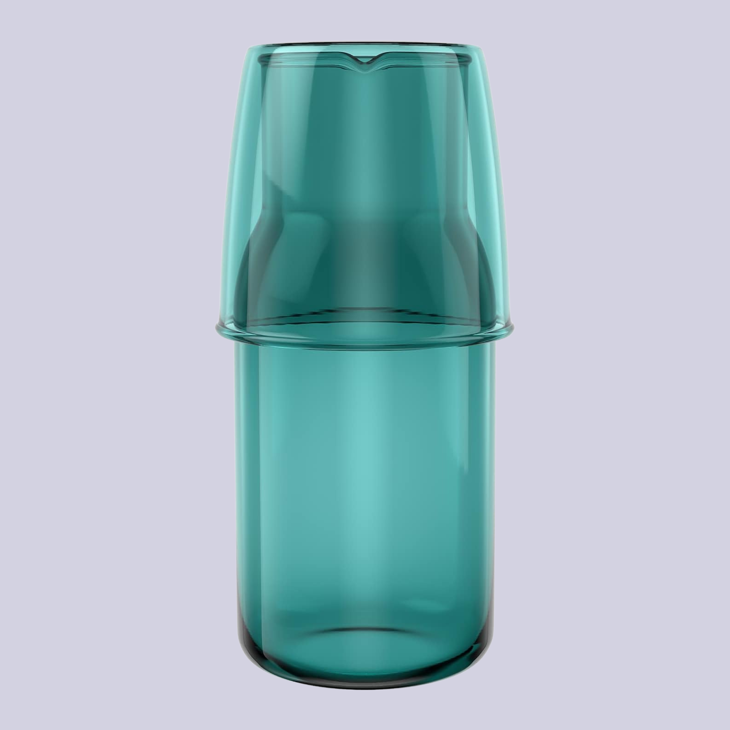 A clear green water carafe and glass set