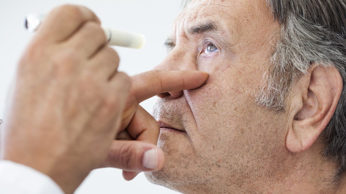 To prevent glaucoma complications, eye exams are a must. Here, an elderly man examined by an ophthalmologist.