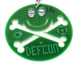 Front view of the green press badge