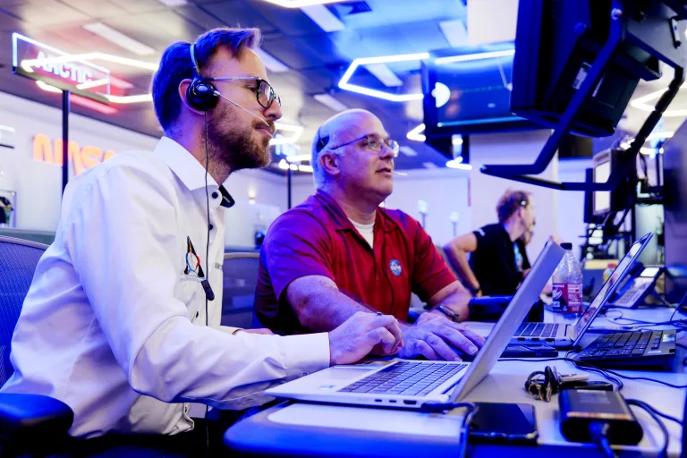 The Orion Mission Evaluation Room team works during an Artemis II mission simulation.