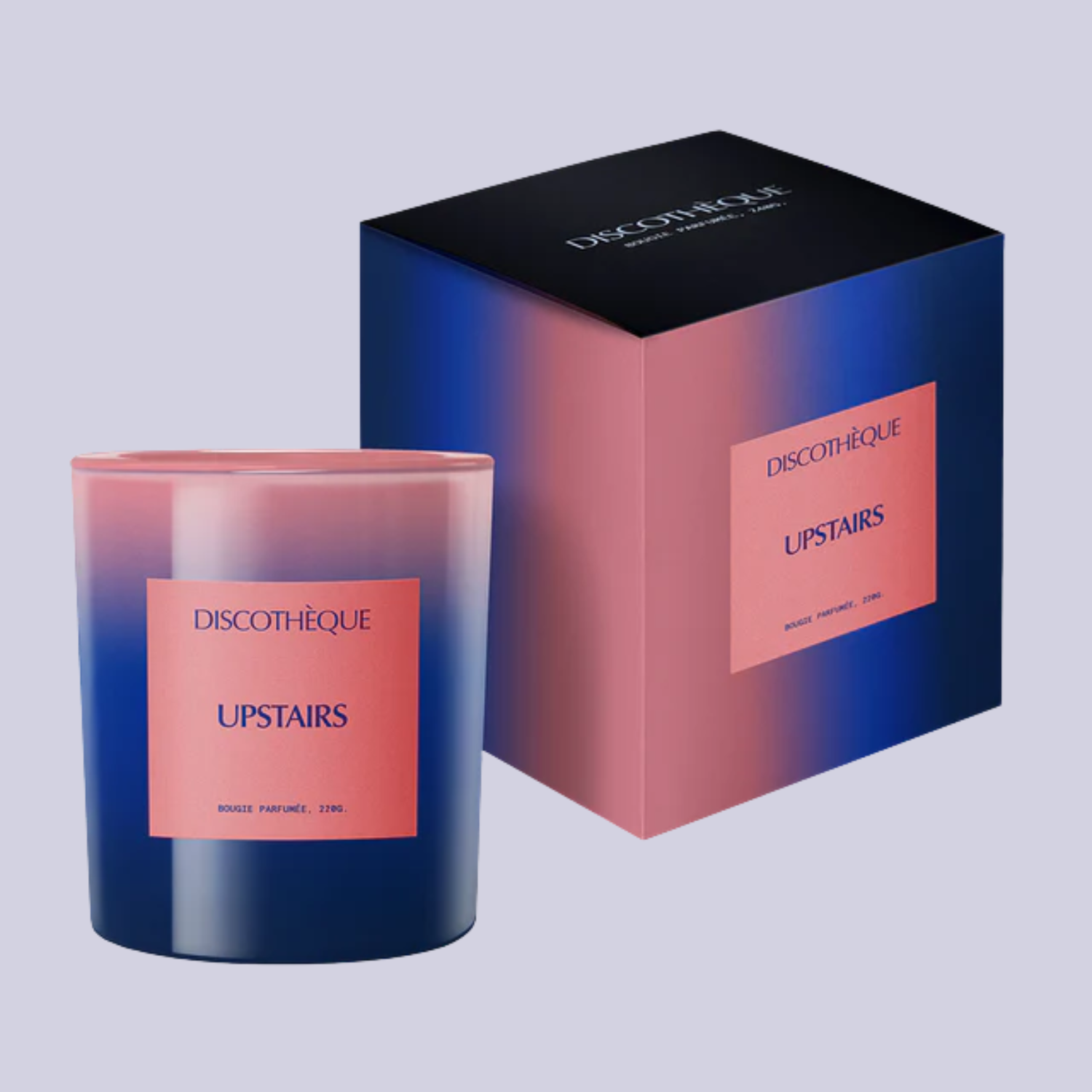 An ombre glass candle and packaging