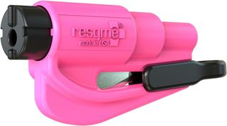 A bright pink Resqme emergency keychain with a hammer head on top and a seatbelt cutting razor on the bottom