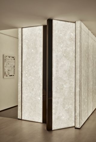 A wardrobe made with back-lit stone