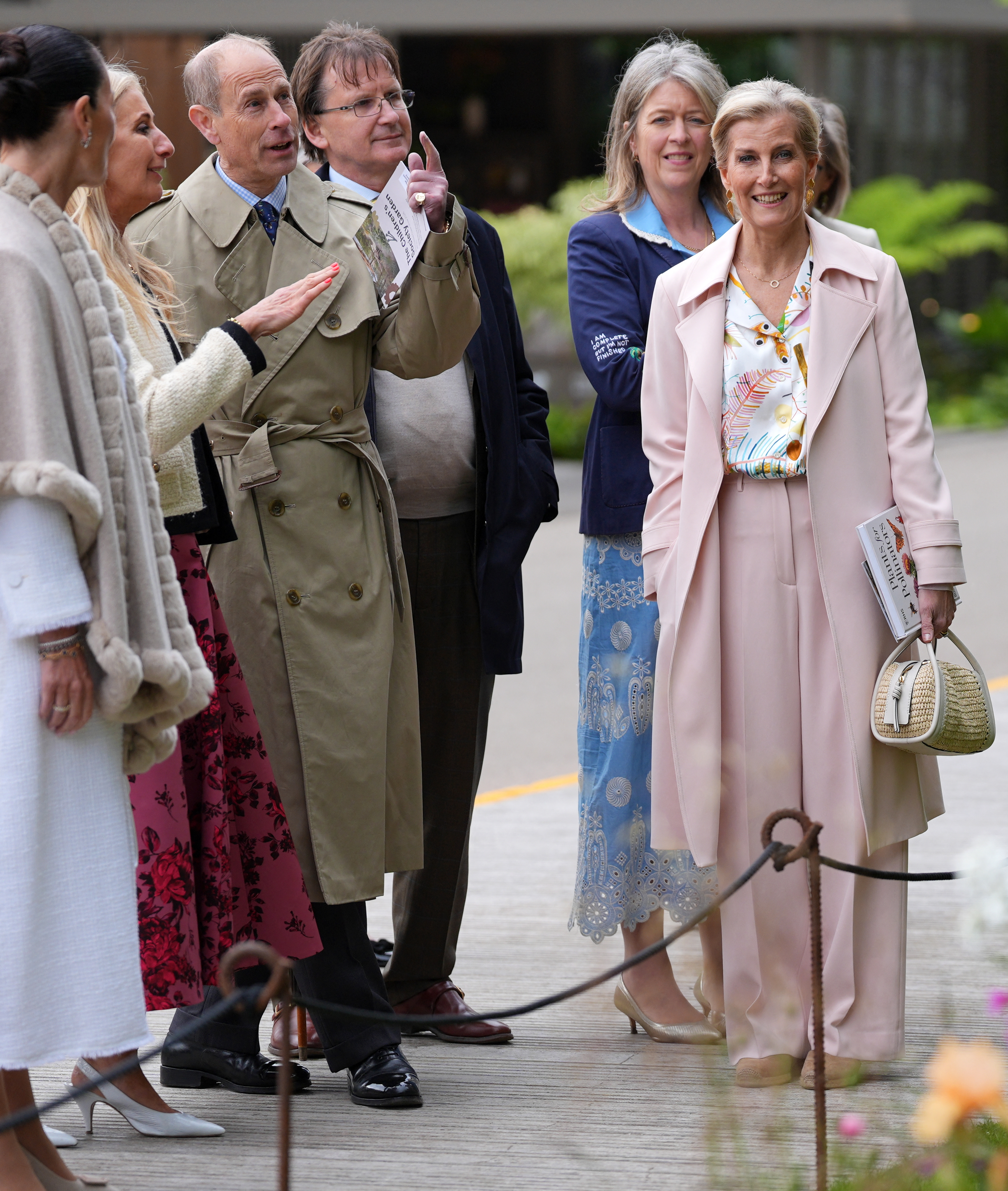 Britain's Prince Edward, Duke of Edinburgh (3L) and Britain's Sophie, Duchess of Edinburgh at the 2026 RHS Chelsea Flower Show in London on May 18, 2026. (Photo by Yui Mok / POOL / AFP)
