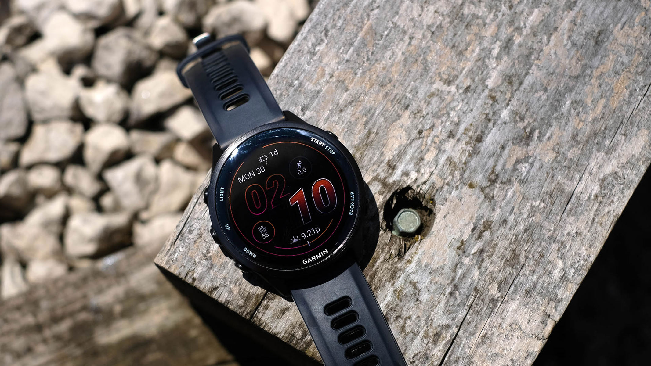 Garmin Forerunner 570 on a piece of wood