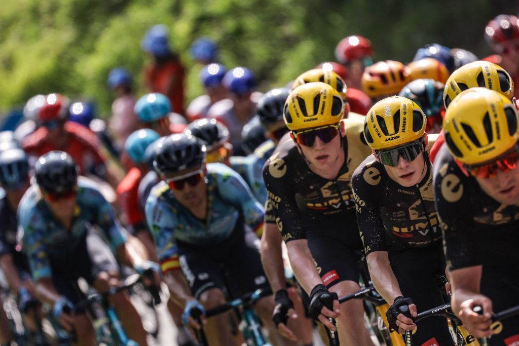 JumboVismas Danish rider Jonas Vingegaard 2nd R cycles with the pack of riders during the 3rd stage of the 110th edition of the Tour de France cycling race 1935 km between AmorebietaEtxano in Northern Spain and Bayonne in southwestern France on July 3 2023 Photo by Thomas SAMSON AFP Photo by THOMAS SAMSONAFP via Getty Images