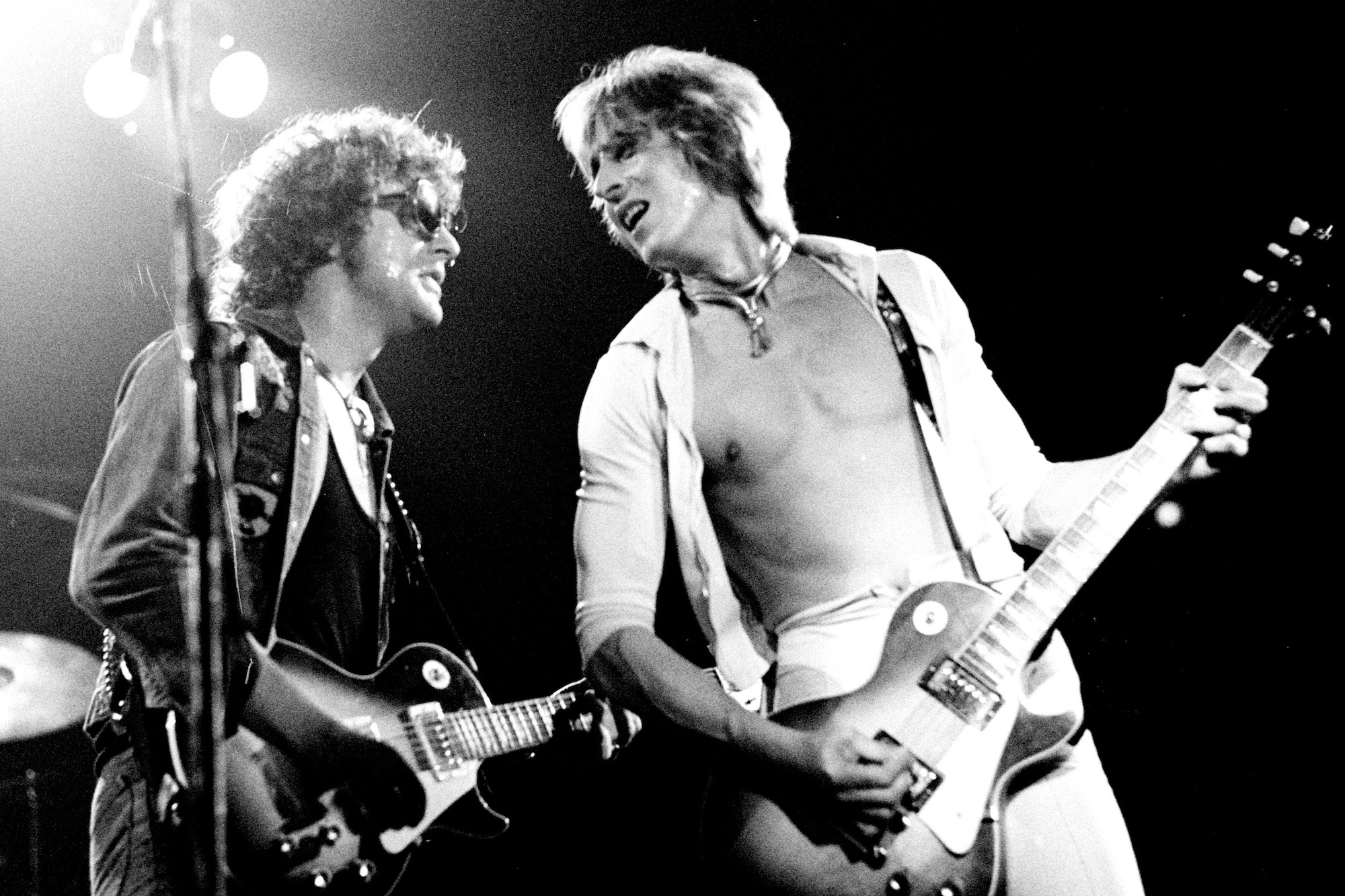 Ian Hunter (left) and Mick Ronson perform live with Mott The Hoople on their last ever show at Concertgebouw in Amsterdam, Netherlands on November 3, 1974