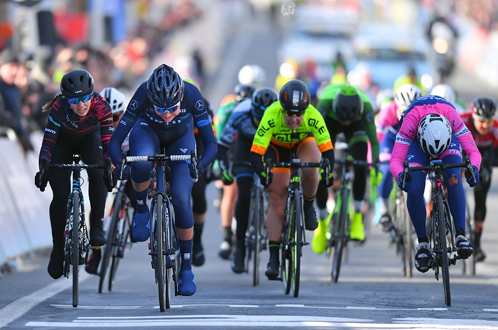 Christina Siggaard wins the sprint at Omloop Het Nieuwsblad