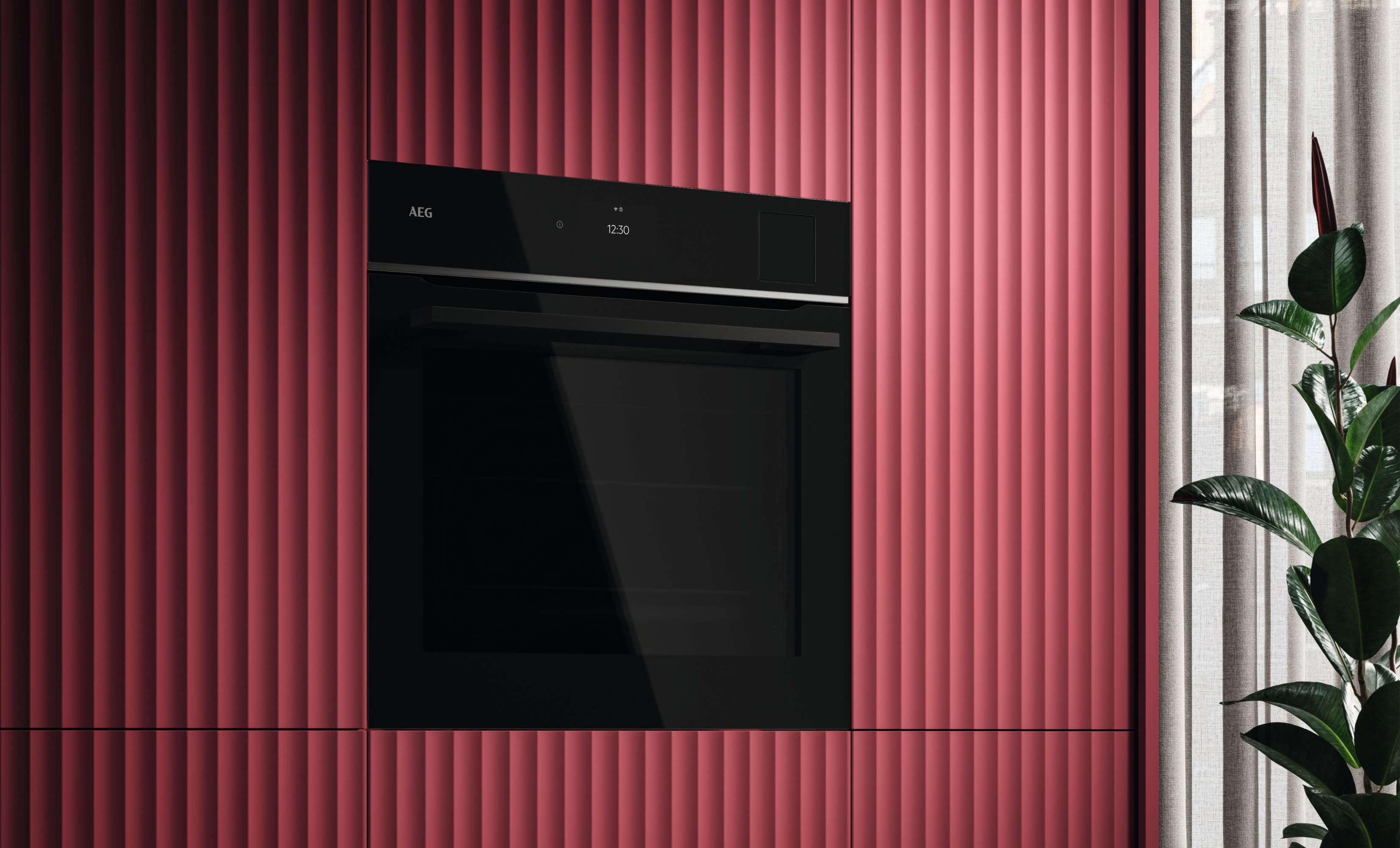 AEG steam oven in red cabinetry