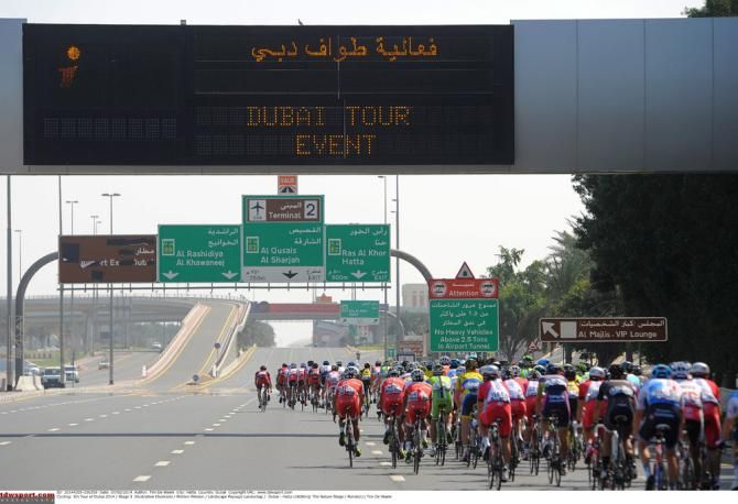 The Dubai Tour peloton rolls along during stage 3