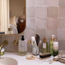 Emma Hoareau's bathroom sink with skincare products 