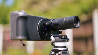 Vivo X200 Ultra phone with teleconverter attached