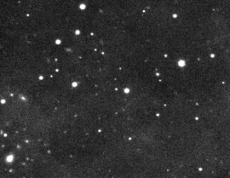 Views from the Subaru telescope that led to the discovery of 2018 VG18, visible moving between the two frames at center.