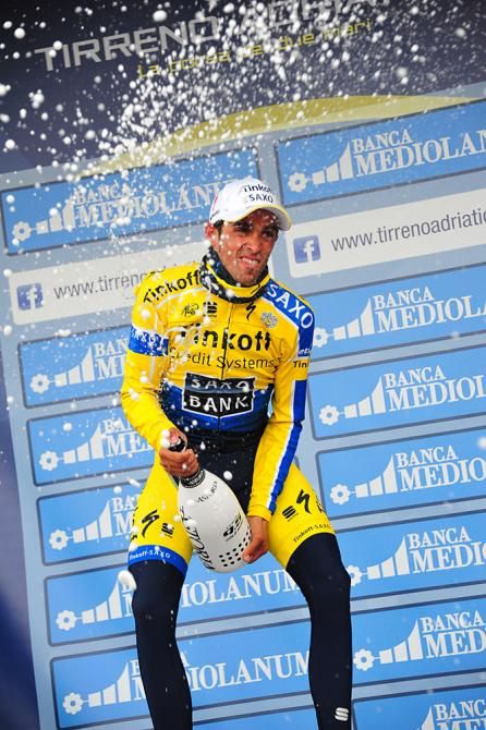 Alberto Contador (Tinkoff-Saxo) puts his chi into the champagne spraying