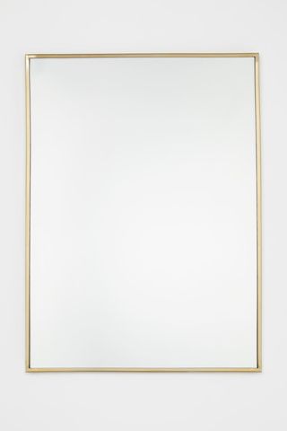 Rectangular mirror with gold frame from H&M Home.