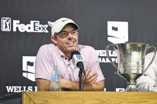 Rory McIlroy poses with the Wells Fargo Championship