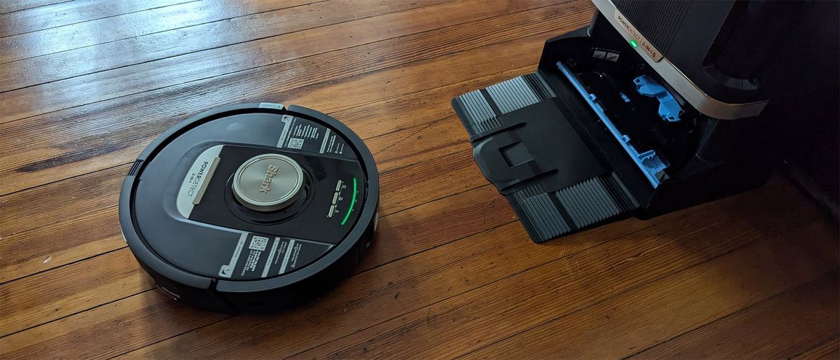 The Shark PowerDetect Robot Vacuum and Mop leaving its charging station