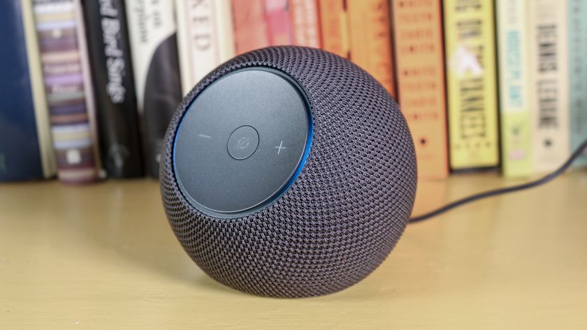 Echo Dot Max on a book shelf
