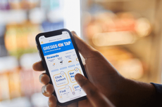 Press Marketing image showing a person using the greggs app home screen