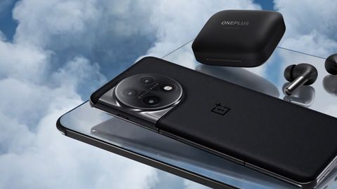 A OnePlus 11 and tablet and earbuds floating in front of clouds