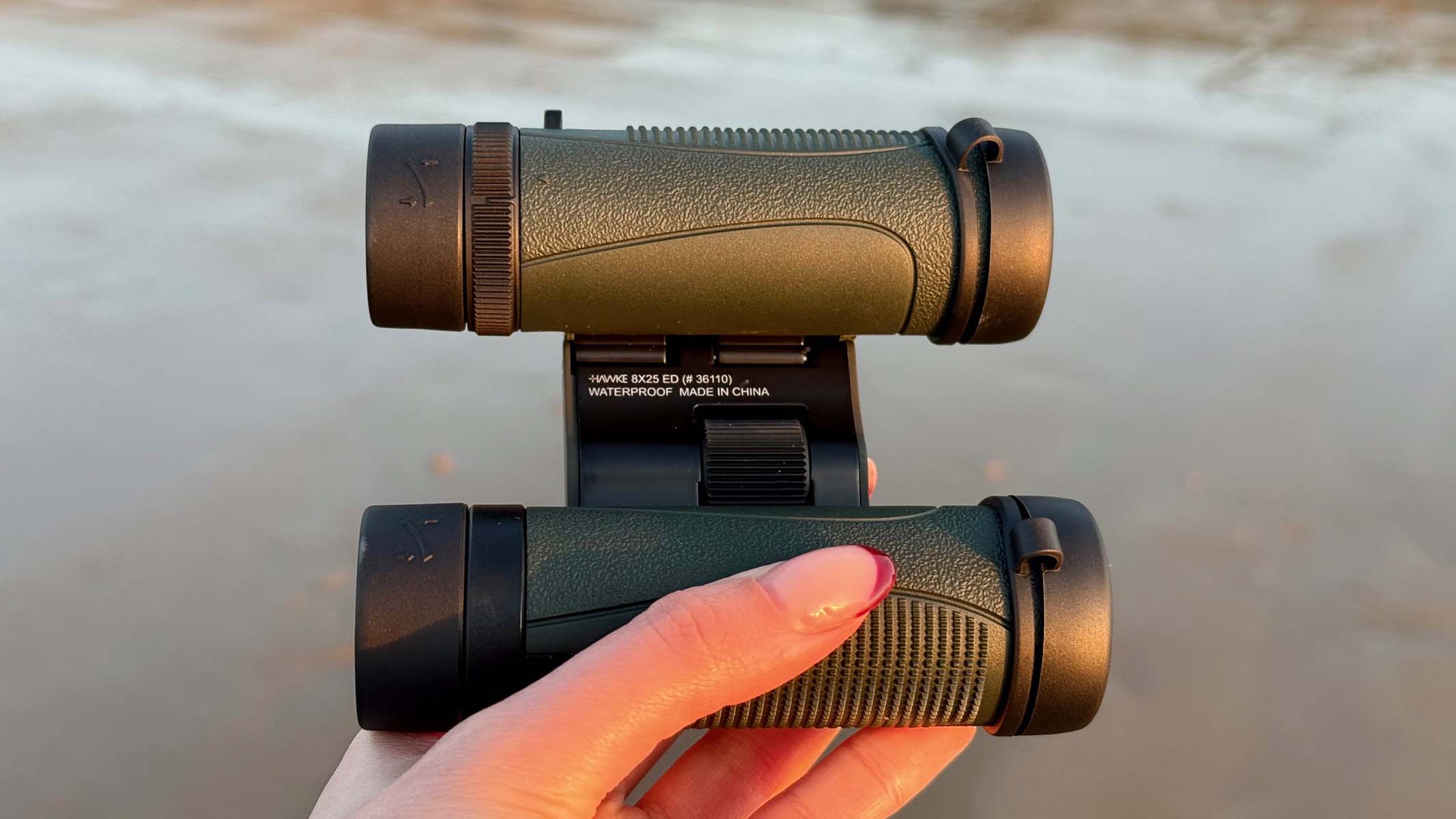 Hawke Endurance ED 8x25 in the hand at a coastal location