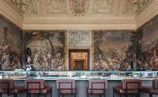 One of the restaurants in the Palacio Chiado. Bar style area goes from wall to wall, with brown leather bar chairs. Beautiful, elaborate frescoes grace the walls and ceilings.