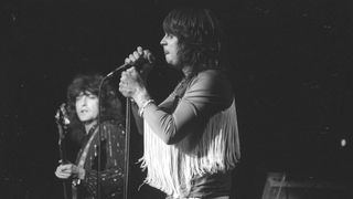 Ozzy Osbourne band performs on stage on the 'Blizzard Of Ozz' tour, United Kingdom, September-October 1980. Ozzy Osbourne (vocals), Bob Daisley (bass)