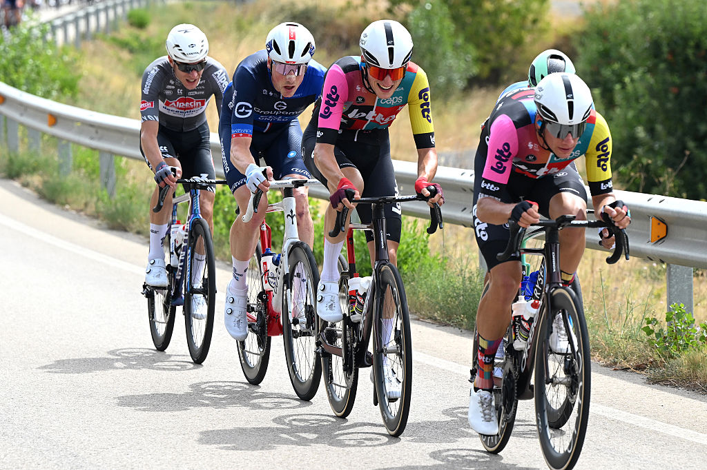 ALFARO, SPAIN - AUGUST 31: (L-R) Stefan Kung of Switzerland and Team Groupama - FDJ and Liam Slock of Belgium and Team Lotto compete during the La Vuelta - 80th Tour of Spain 2025, Stage 9 a 195.5km stage from Alfaro to Estacion de Esqui de Valdezcaray 1541m / #UCIWT / on August 31, 2025 in Alfaro, Spain. (Photo by Dario Belingheri/Getty Images)