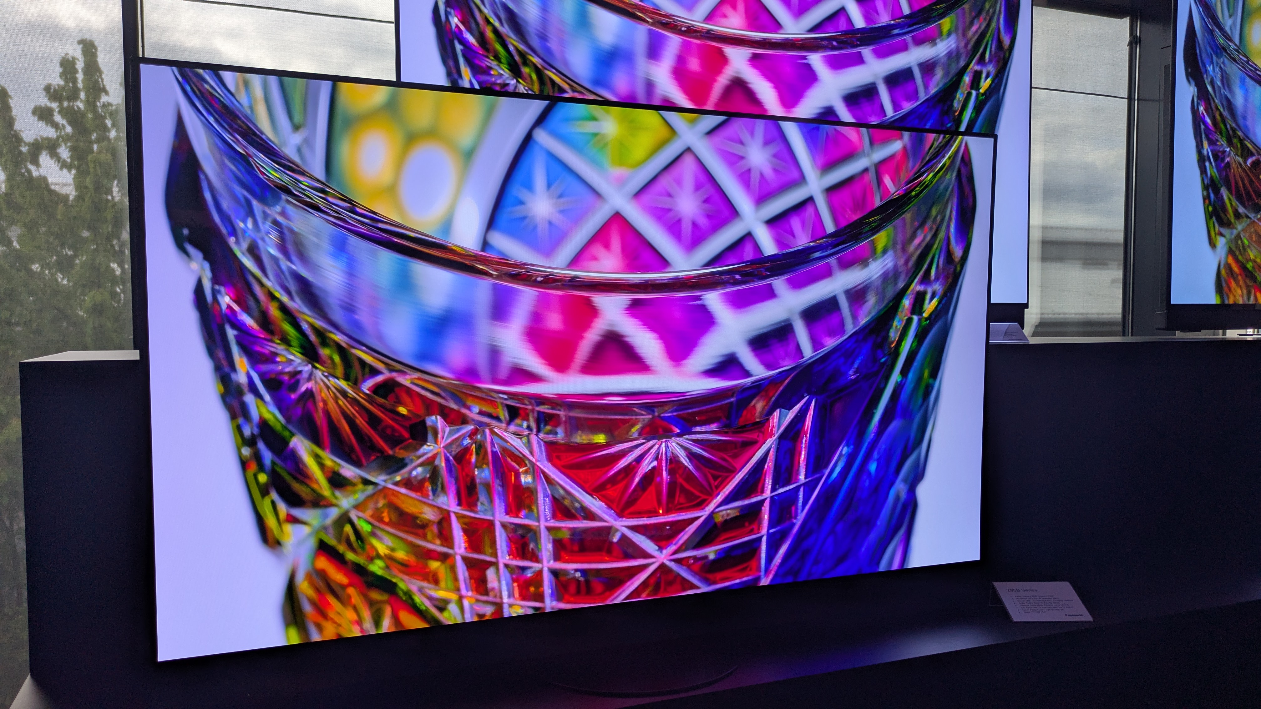 Panasonic Z95B OLED TV displaying colored glass
