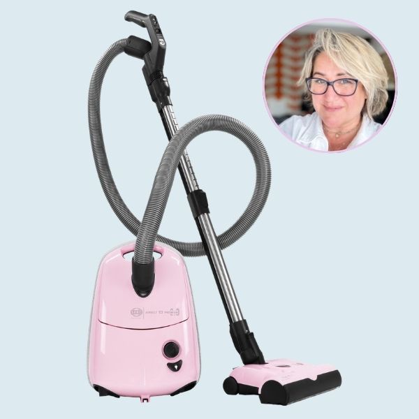 The SeboAirbelt E3 Premium Pastel Pink 2.0, a Reader Approved Awards cleaning category winner, with an inset portrait of the tester.