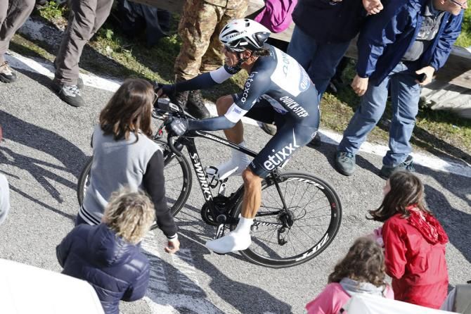 Rigoberto Uran (Omega Pharma-QuickStep) muscles his way up the Monte Grappa time trial