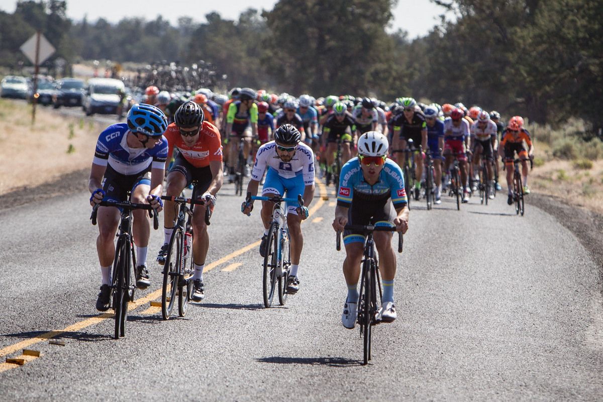 Riders split off the front of the bunch as a break goes up the road