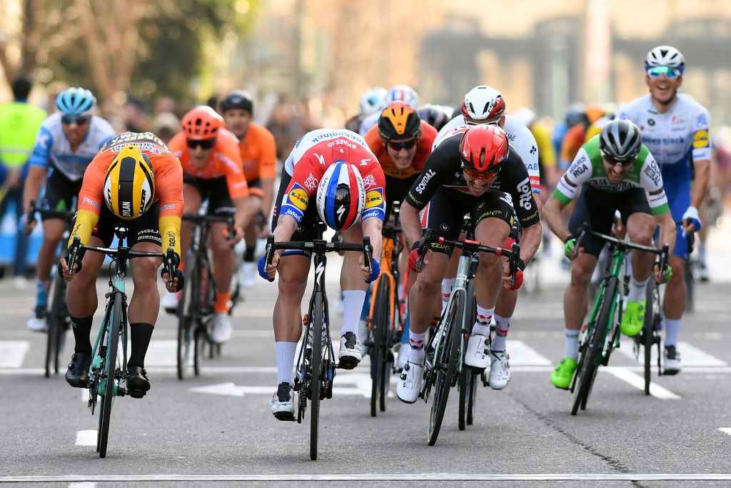VALENCIA SPAIN FEBRUARY 09 Sprint Arrival Fabio Jakobsen of The Netherlands and Team Deceuninck QuickStep Dylan Groenewegen of The Netherlands and Team JumboVisma Orange Combined Jersey John Degenkolb of Germany and Team LottoSoudal Alexander Kristoff of Norway and UAE Team Emirates Ivan Garcia Cortina of Spain and Team BahrainMclaren Matteo Trentin of Italy and CCC Team Davide Ballerini of Italy and Team Deceuninck QuickStep during the 71st Volta a la Comunitat Valenciana 2020 Stage 5 a 977km stage from Paterna Valencia VueltaCV VCV2020 on February 09 2020 in Valencia Spain Photo by David RamosGetty Images