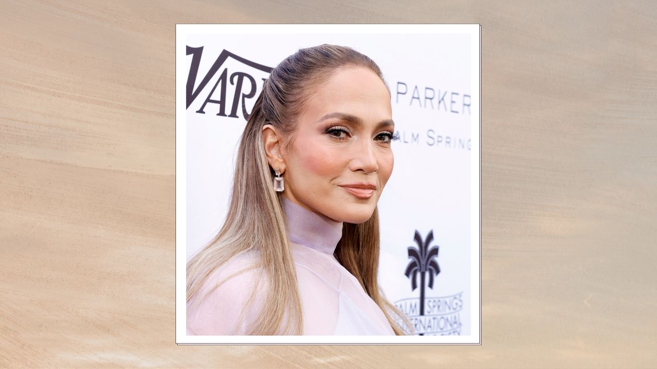 Jennifer Lopez is pictured with half up-half down hair and wearing a sheer, lilac dress at Variety&#039;s 10 Directors To Watch &amp; Creative Impact Awards, Palm Springs International Film Festival 2025 at Parker Palm Springs on January 04, 2025 in Palm Springs, California/ in a beige to grey gradient sunset-style template