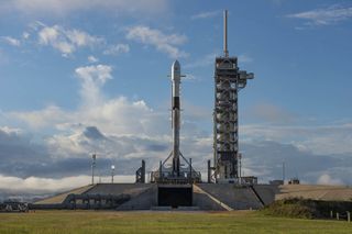 A SpaceX Falcon 9 rocket carrying the Es'hail-2 communications satellite for Qatar stands atop Launch Pad 39A at NASA's Kennedy Space Center in Cape Canaveral, Florida ahead of its planned launch on Nov. 15, 2018.