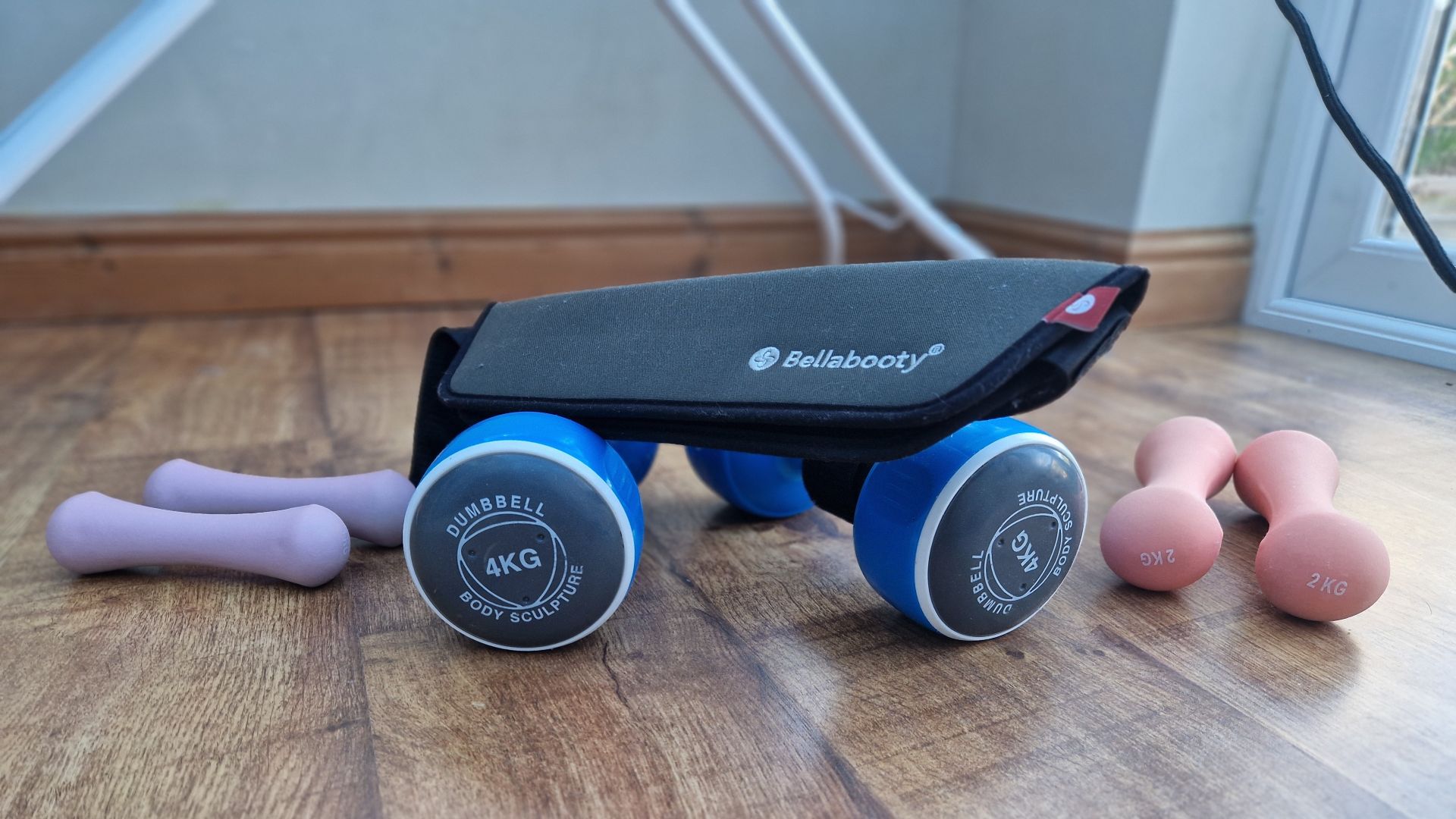 Bellabooty band presented with some dumbbells