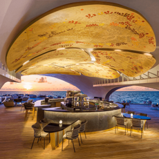 A Marriott hotel bar with a view of the sea 