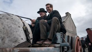 Padraic and Colm share a laugh on a horse drawn carriage in The Banshees of Inisherin, one of the new HBO Max movies