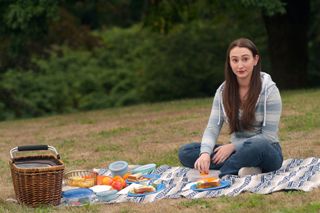 Marah Ryan sitting on a picnic blanket