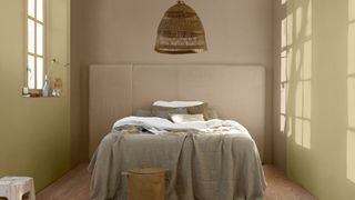 bedroom with Dulux colour of the year 2023 Wild Wonder on the end walls with contrasting color as a feature wall