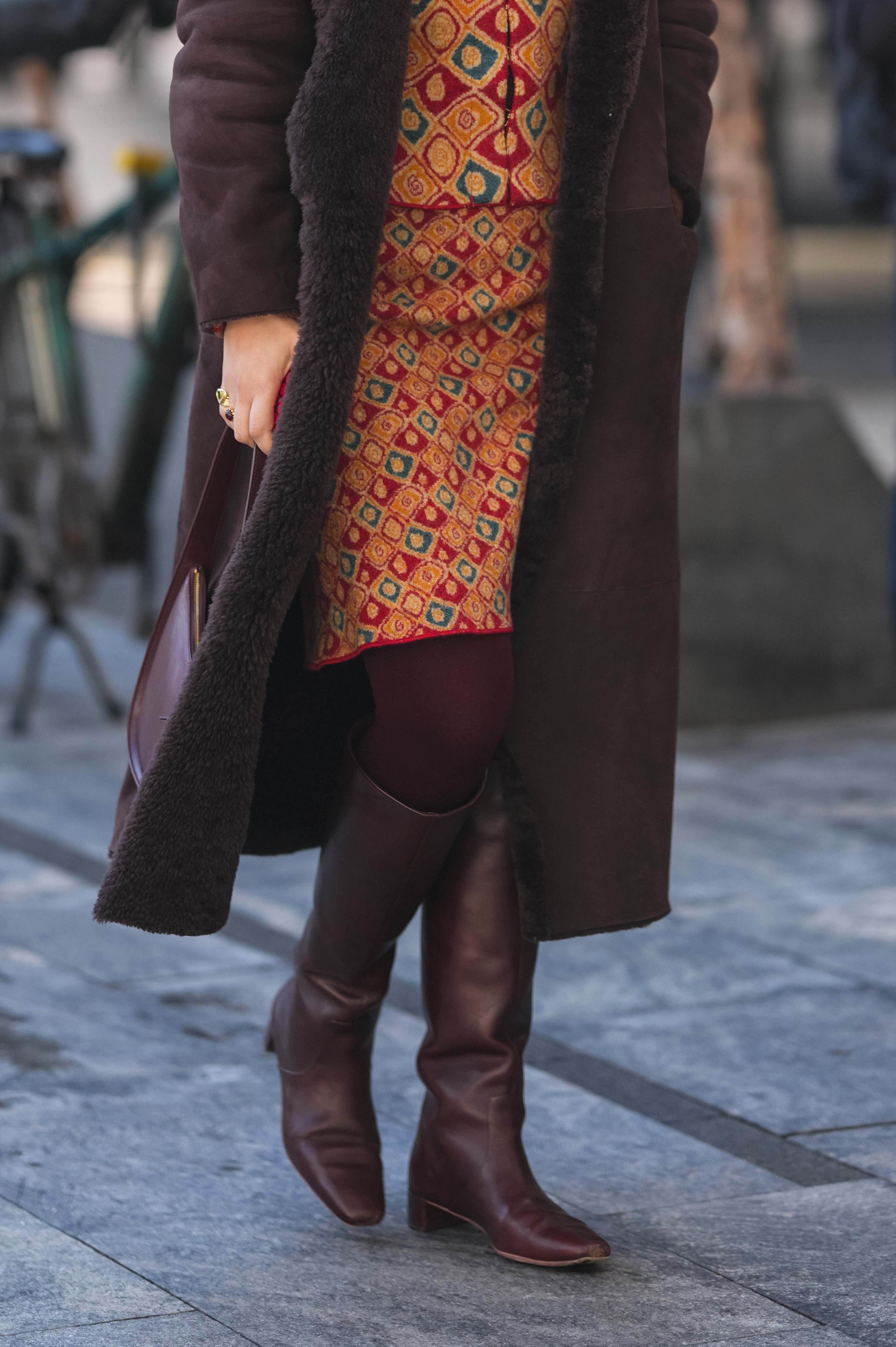 Woman in brown knee high boots