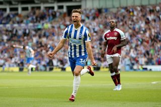 Joel Veltman of Brighton & Hove Albion celebrates after scoring their side's first goal during the Premier League match between Brighton & Hove Albion and West Ham United at American Express Community Stadium on May 22, 2022 in Brighton, England.