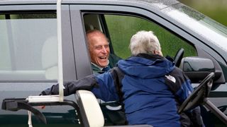 Prince Philip, Duke of Edinburgh watches the Dressage phase of the Carriage Driving competition whilst sitting in his Land Rover on day 2 of the Royal Windsor Horse Show in Home Park on May 14, 2015 in Windsor, England