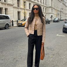 fashion influencer @symphonyofsilk wearing the cropped jacket trend